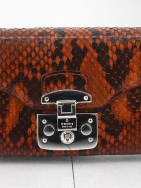 Gucci Orange-Brown Snakeskin Clutch with Silver Hardware